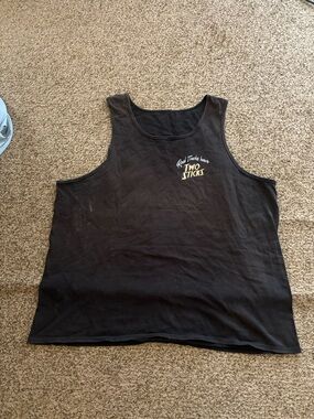 Graphic Image Black Tank with Small Yellow Chest Script